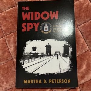 The widow spy by Martha d Peterson. Brand new book